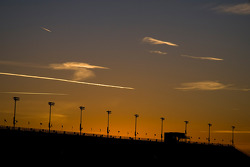 The sun sets on the grandstand at the Auto Club Speedway of Southern California