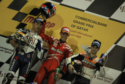 Podium: race winner Casey Stoner with Jorge Lorenzo and Dani Pedrosa