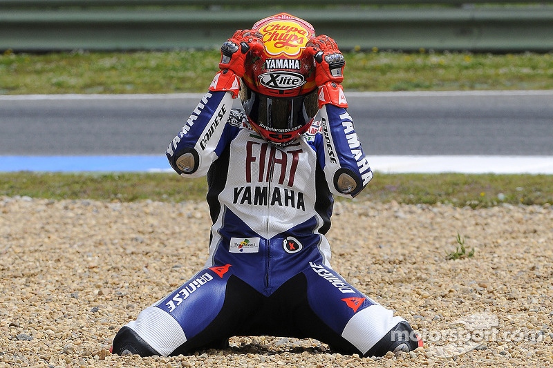 Race winner Jorge Lorenzo celebrates