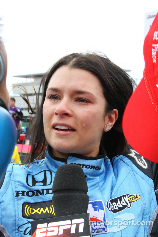 Race winner Danica Patrick gives interviews