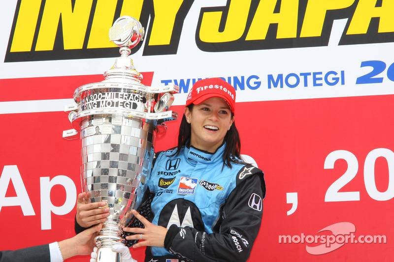 Podium: race winner Danica Patrick celebrates