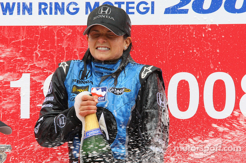 Podium: race winner Danica Patrick celebrates