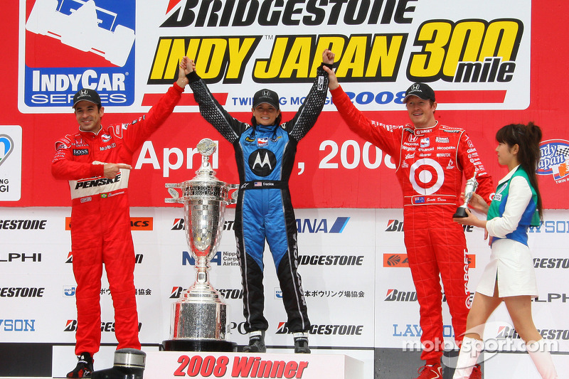 Podium: race winner Danica Patrick with Helio Castroneves and Scott Dixon