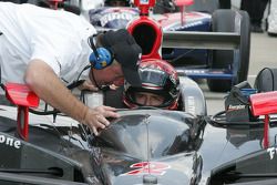 A.J. Foyt IV receives instruction from Brian Barnhart