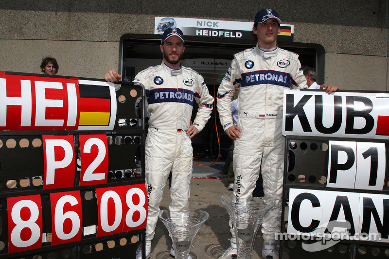 BMW Sauber F1 team celebrations: race winner Robert Kubica celebrates with Nick Heidfeld