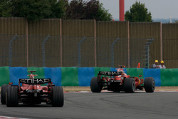 Kimi Raikkonen, Scuderia Ferrari, leads Felipe Massa, Scuderia Ferrari