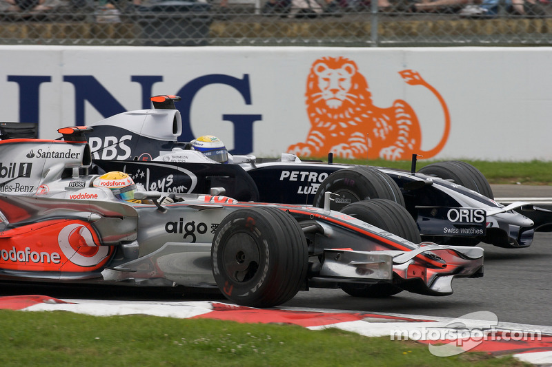 Lewis Hamilton, McLaren Mercedes, passes Nico Rosberg, WilliamsF1 Team
