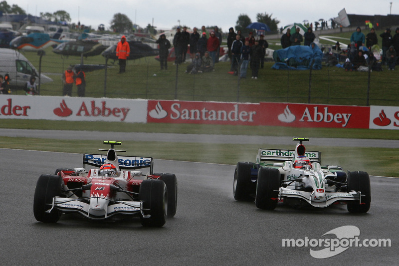 Timo Glock, Toyota F1 Team, TF108 and Rubens Barrichello, Honda Racing F1 Team, RA108