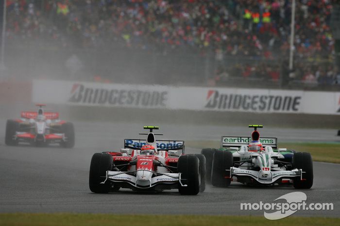 Timo Glock, Toyota F1 Team, TF108 y Rubens Barrichello, Honda Racing F1 Team