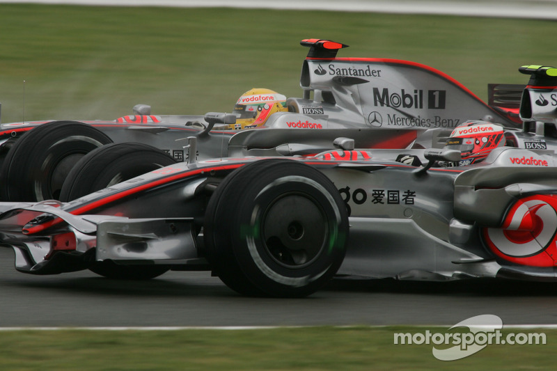 Lewis Hamilton, McLaren Mercedes overtakes Heikki Kovalainen, McLaren Mercedes