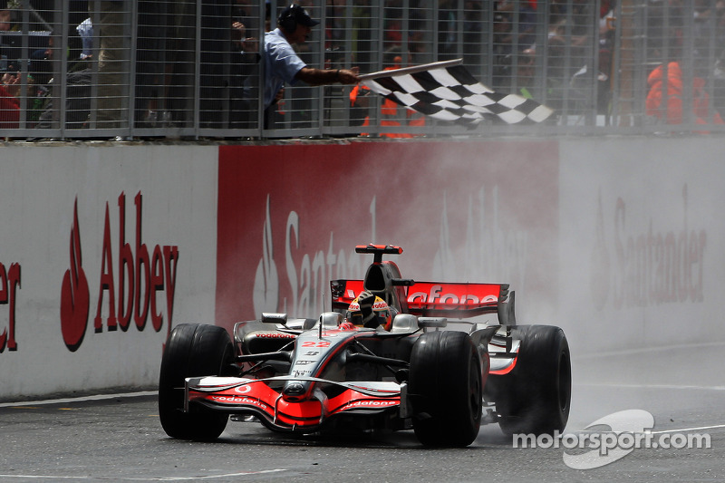 Race winner Lewis Hamilton celebrates