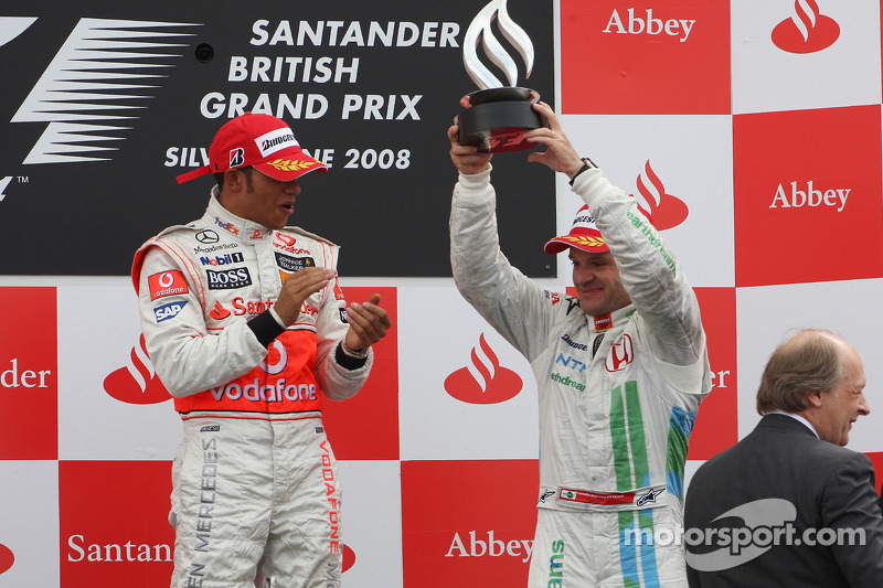 Podium: race winner Lewis Hamilton with third place Rubens Barrichello