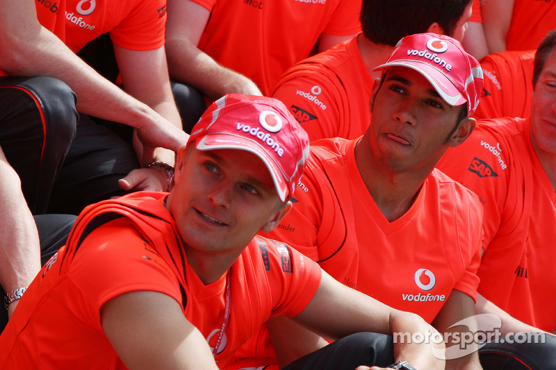 McLaren Mercedes victory celebration: race winner Lewis Hamilton celebrates with Heikki Kovalainen, 