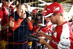 Sebastian Vettel, Ferrari signs autographs for the fans