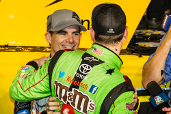 Victory lane: race winner and 2015 NASCAR Sprint Cup series champion Kyle Busch, Joe Gibbs Racing Toyota congratulated by Jeff Gordon, Hendrick Motorsports Chevrolet