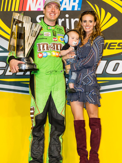 Victory lane: race winner and 2015 NASCAR Sprint Cup series champion Kyle Busch, Joe Gibbs Racing Toyota celebrates with wife Samantha