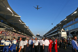 An Etihad plane flies over the grid