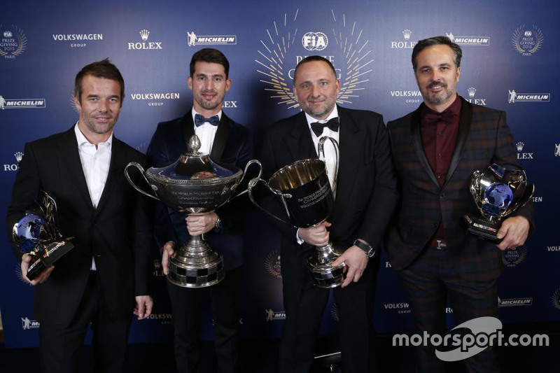 The Citroen team receives its awards for dominating the WTCC, with drivers' champion Jose Maria Lopez joined by teammates Sebastien Loeb and Yvan Muller as well as team boss Yves Matton.