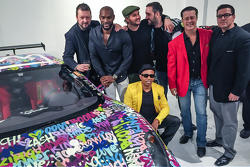 Ben Levy with Tyson Beckford, Steve Hawthorne, Neil Handler and friends pose with the Ferrari F430