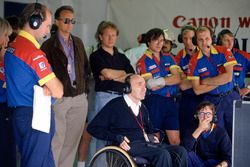 Adrian Newey, left, and Frank Williams watch the race action