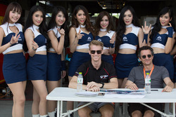 Nicolas Leutwiler and Oliver Webb with grid girls