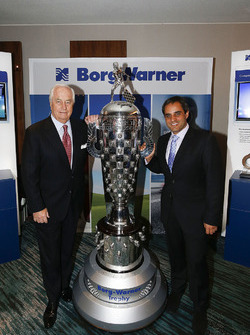 2015 Indy 500 winning owner Roger Penske and Winning Driver Juan Pablo Montoya with the Borg-Warner Trophy