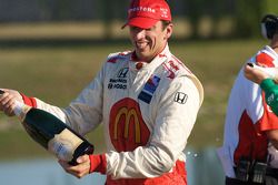 Podium: Justin Wilson sprays champagne