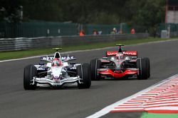 Robert Kubica, BMW Sauber F1 Team, F1.08; Heikki Kovalainen, McLaren Mercedes, MP4-23