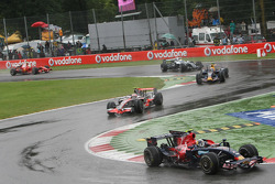 Start: Sebastian Vettel, Scuderia Toro Rosso, STR03 leads Heikki Kovalainen, McLaren Mercedes, MP4-23