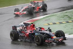 Sebastian Vettel, Scuderia Toro Rosso, STR03 leads Heikki Kovalainen, McLaren Mercedes, MP4-23