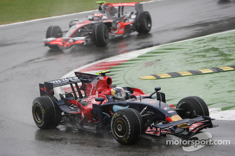 Sebastian Vettel, Scuderia Toro Rosso, STR03 leads Heikki Kovalainen, McLaren Mercedes, MP4-23