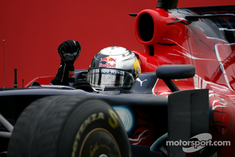 Race winner Sebastian Vettel celebrates