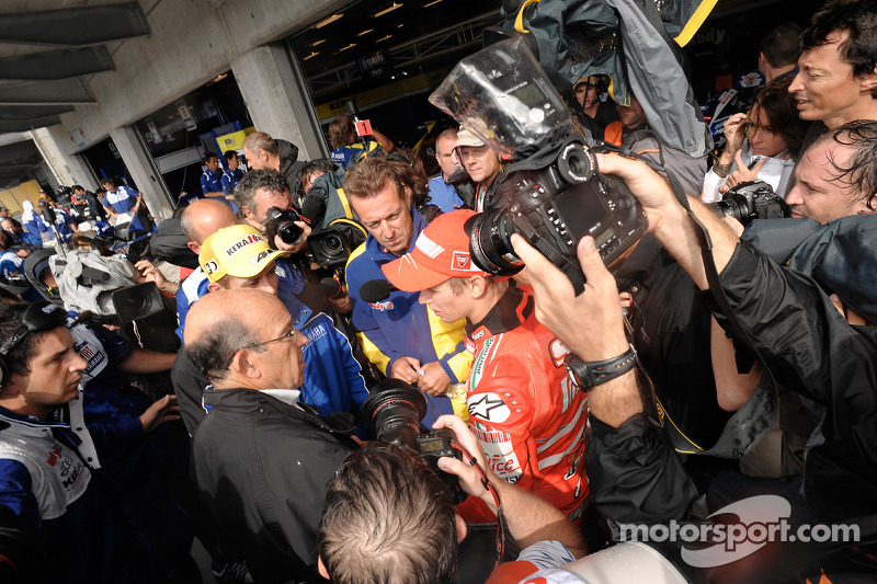 Post-race celebrations with race winner Valentino Rossi, Casey Stoner and Jorge Lorenzo