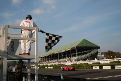 Tony Brooks and Ferrari Dino takes the checkered flag