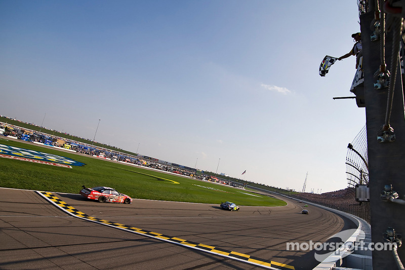 Jimmie Johnson takes the checkered flag in front of Carl Edwards