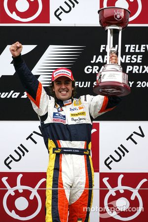 Podium: race winner Fernando Alonso celebrates