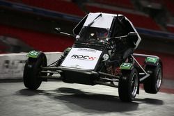 Jenson Button takes off at the jump on the bridge in ax RX150 Buggy