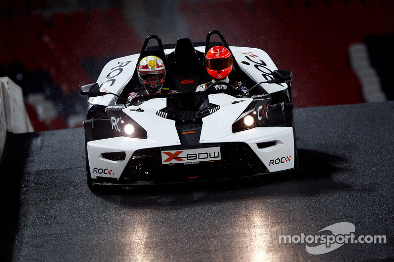 Michael Schumacher on the bridge with Tom Kristensen in the passenger seat