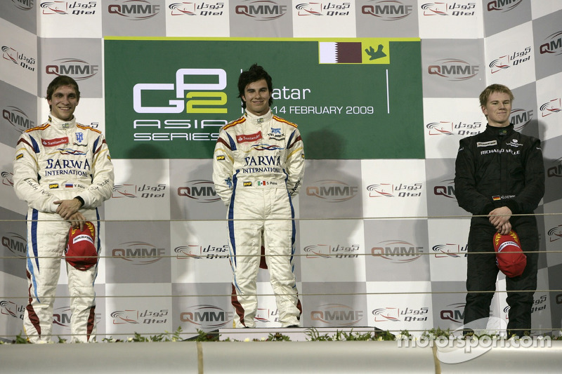 Podio: ganador Sergio Pérez, segundo Vitaly Petrov, tercero Nico Hulkenberg