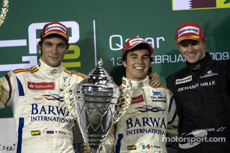 Podium: winner Sergio Perez, second place Vitaly Petrov, third place Nico Hulkenberg