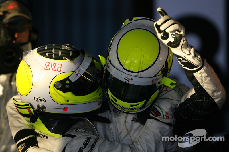 Jenson Button, Brawn GP, celebrates with second place Rubens Barrichello, Brawn GP