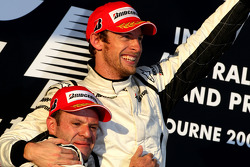 Podium: race winner Jenson Button, Brawn GP, second place Rubens Barrichello