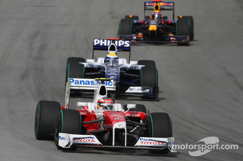 Timo Glock, Toyota F1 Team et Nico Rosberg, Williams F1 Team