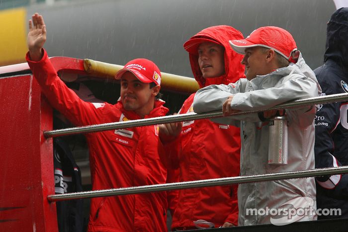 Felipe Massa, Scuderia Ferrari, Kimi Raikkonen, Scuderia Ferrari, e Heikki Kovalainen, McLaren Mercedes