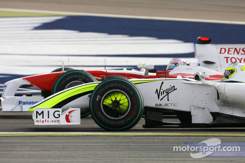 Rubens Barrichello, Brawn GP and Jarno Trulli, Toyota F1 Team