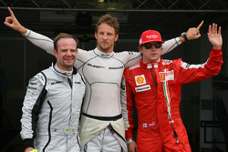 Jenson Button, Brawn GPgets pole position, Rubens Barrichello, Brawn GP 2nd and Kimi Raikkonen, Scuderia Ferrari 3rd