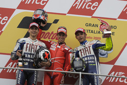 Podium: 1. Casey Stoner, 2. Jorge Lorenzo, 3. Valentino Rossi