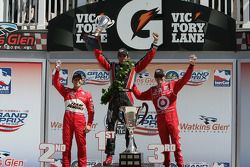 Podium: race winner Justin Wilson, Dale Coyne Racing, second place Ryan Briscoe, Team Penske, third place Scott Dixon, Target Chip Ganassi Racing