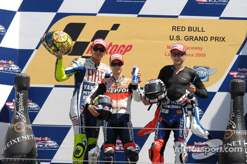 Podio: ganador de la carrera Dani Pedrosa, Repsol Honda Team, segundo lugar Fiat Yamaha Team, Valent