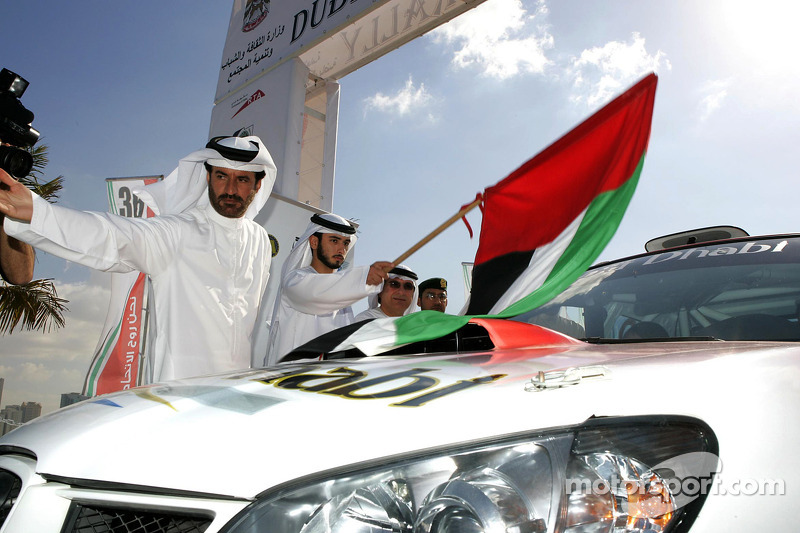 FIAâ€™s Vice-President for sport and 14-time Middle East Rally Champion Mohamed Ben Sulayem gives the start flag for Dubai International Rally